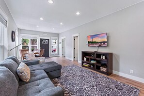 House, Multiple Beds, Kitchen, Garden View (443 E 10th St. Loveland) | Living area | 40-inch TV with digital channels - Cozy Chic Home in Downtown Loveland! (Loveland)