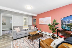Condo, 1 Queen Bed with Sofa bed, Patio, Garden View (220 Peterson St Unit 2) | Living area | 40-inch TV with digital channels - The Coral Suite, Stylish Stay in Old Town FoCo (Fort Collins)