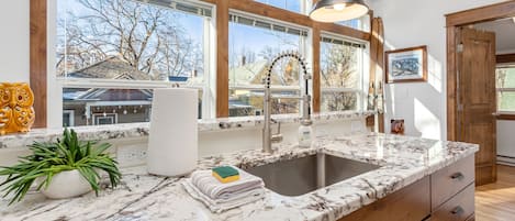 Apartment, 1 King Bed with Sofa bed, Patio, Garden View (722 Mathews St.) | Private kitchen | Fridge, microwave, dishwasher, coffee/tea maker