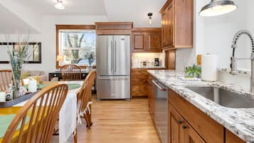 Apartment, 1 King Bed with Sofa bed, Patio, Garden View (722 Mathews St.) | Private kitchen | Fridge, microwave, dishwasher, coffee/tea maker