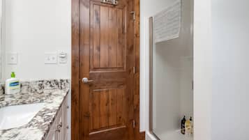 Apartment, 1 King Bed with Sofa bed, Patio, Garden View (722 Mathews St.) | Bathroom | Shower, designer toiletries, hair dryer, towels