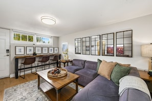 Apartment, Multiple Beds, Kitchen, Garden View (1944 7th Ave. - Lower) | Living area | 40-inch TV with digital channels - Inviting Bungalow Next to Unc - Free Cruiser Bikes! (Greeley)