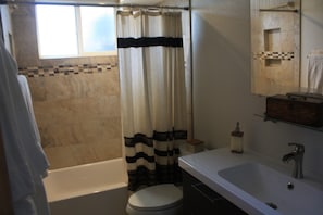 Hair dryer, towels, soap, shampoo