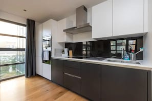 Appartamento Basic, 1 letto king | Cucina privata | Frigorifero, microonde, forno, piano cottura