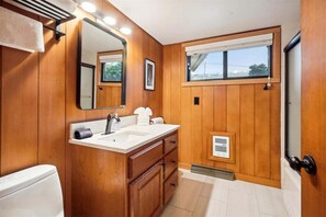 Bathtub, hair dryer, towels