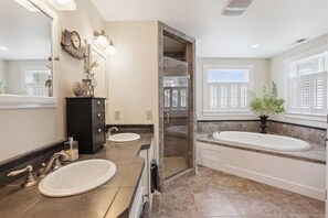 Bathtub, hair dryer, towels