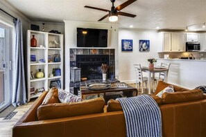 Smart TV, fireplace, DVD player, books