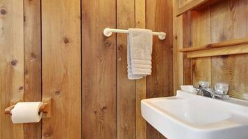 Tina, secadora de cabello, toallas