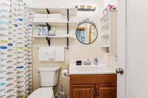 Bathtub, hair dryer, towels