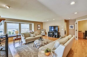 TV, fireplace, books, offices