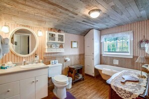 Bathtub, hair dryer, towels