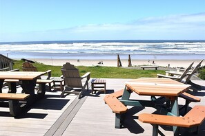 Enjoy ocean views from the patio with a wooden deck and seating area.
