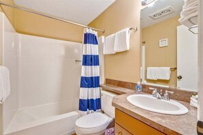 Bathtub, hair dryer, towels