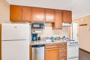 Fridge, microwave, oven, stovetop - Sandcastle Inn #606 - Downtown Apartment! (Cannon Beach)