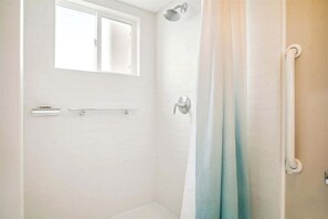 Bathtub, hair dryer, towels