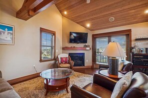 Flat-screen TV, fireplace