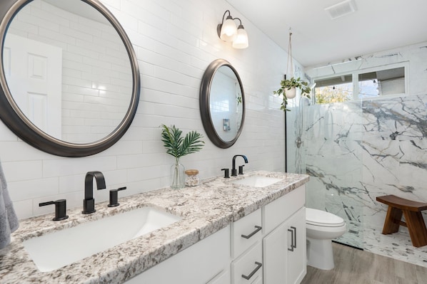 Shower, hair dryer, towels, soap