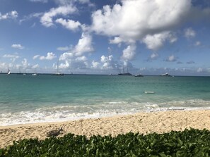 On the beach, sun loungers, beach towels
