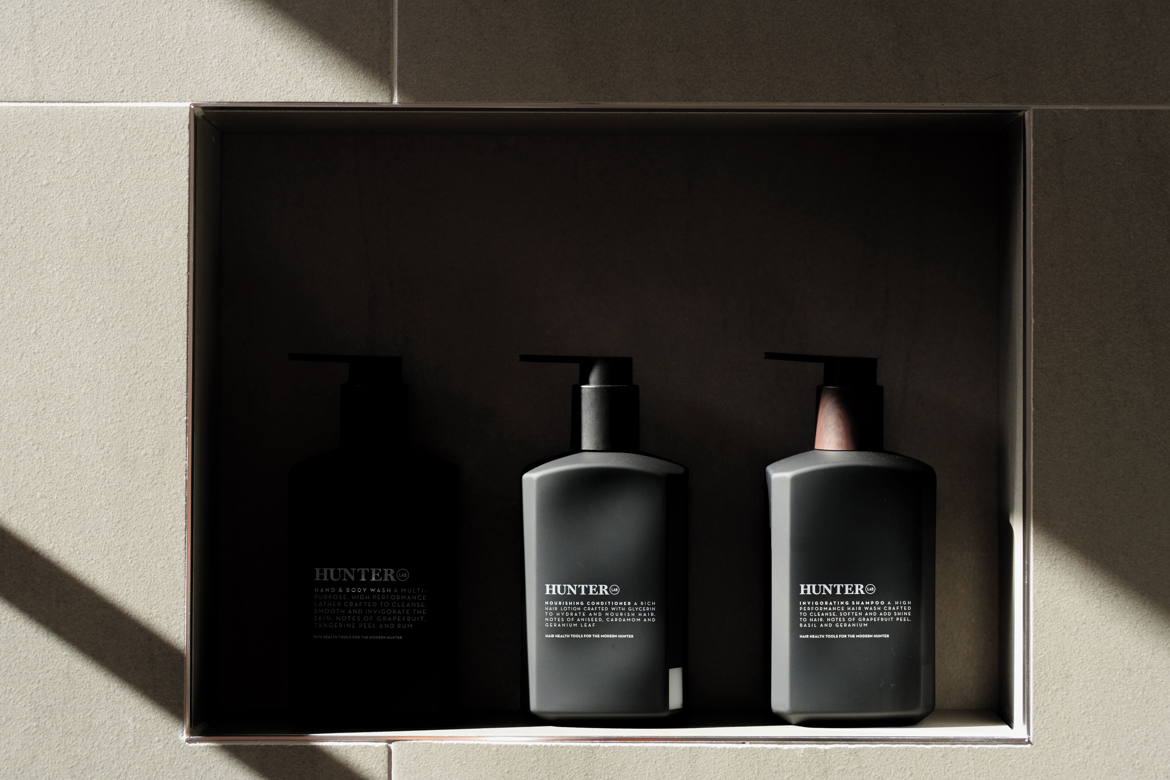 A box containing three Hunter® skincare products.