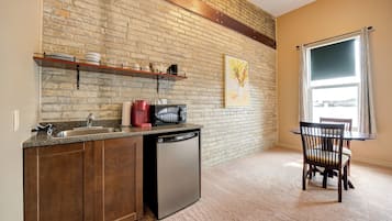 Premium Suite | 1 bedroom, blackout drapes, iron/ironing board, free WiFi