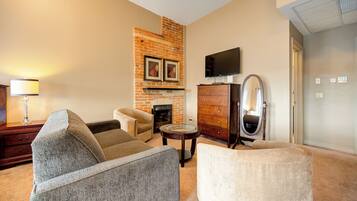 Premium Suite | 1 bedroom, blackout drapes, iron/ironing board, free WiFi