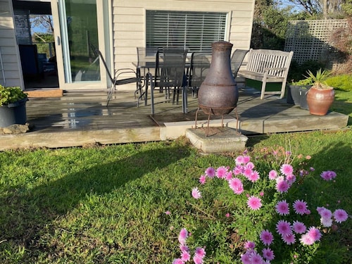 Self-Contained Double Storey Beach House Across the Road from the Beach with Incredible Ocean Views.