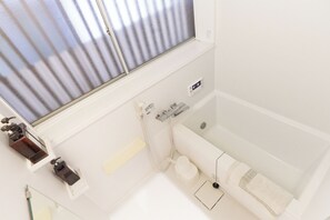 Room | Bathroom | Slippers, towels, soap, shampoo