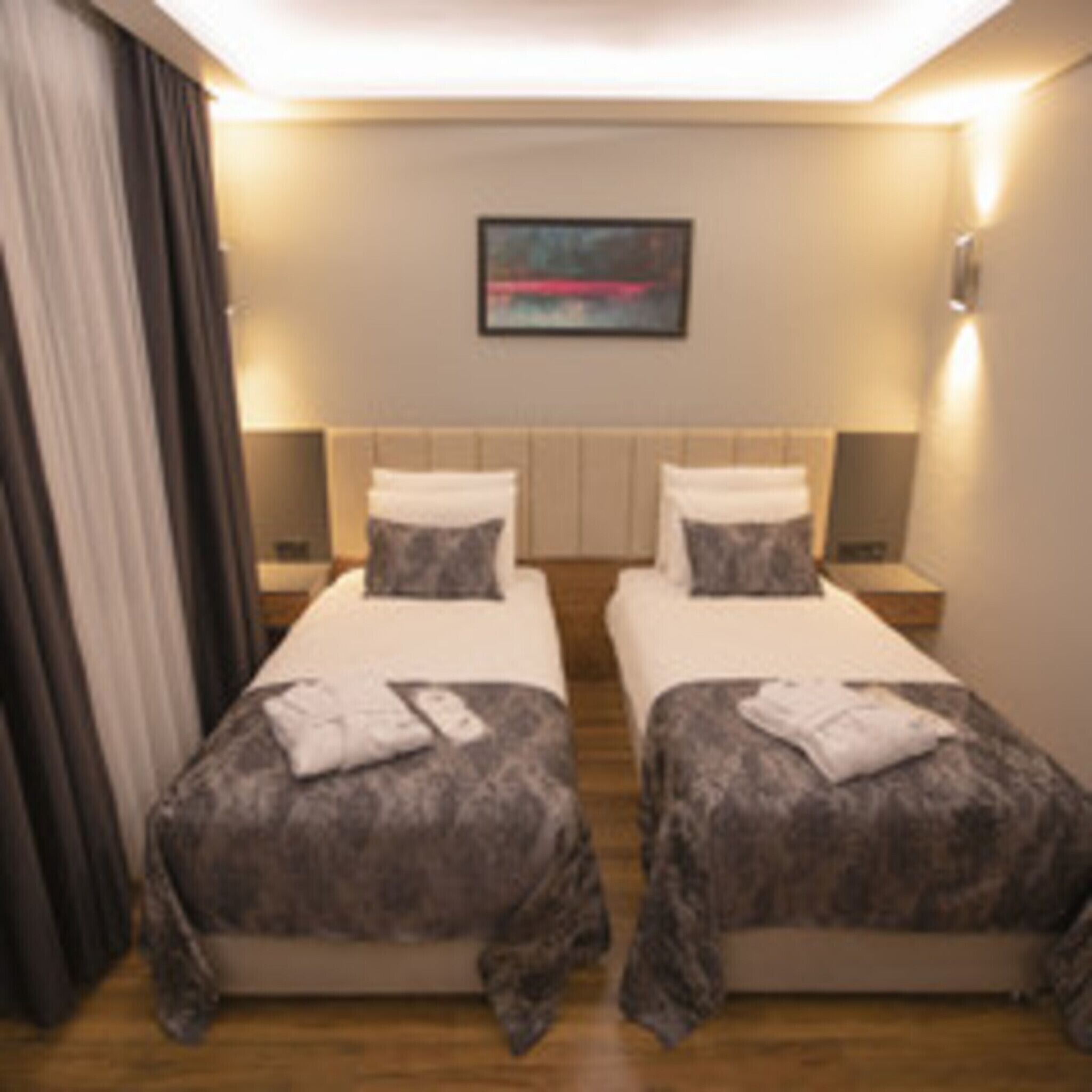 Premium bedding, Select Comfort beds, free minibar items, in-room safe