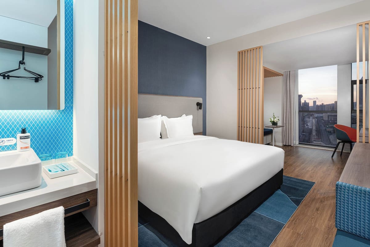 Premium bedding, down comforters, desk, laptop workspace