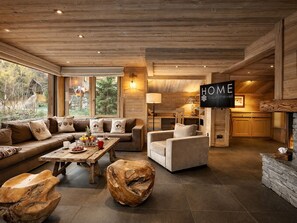 Flat-screen TV, fireplace - Luxurious Chalet in Courchevel-La Tania: Sleeps 12, Ski-in/Ski-out, Jacuzzi, Sauna & Home Cinema (La Tania)