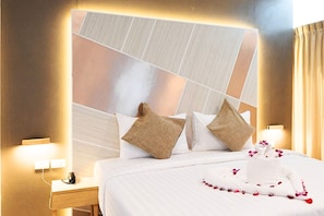 Premium bedding, pillowtop beds, minibar, in-room safe