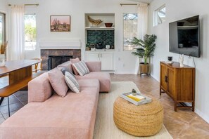 Smart TV, fireplace, video-game console, books