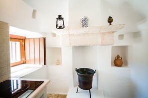 Trullo Deluxe max 5p | Businesscentrum in de kamer