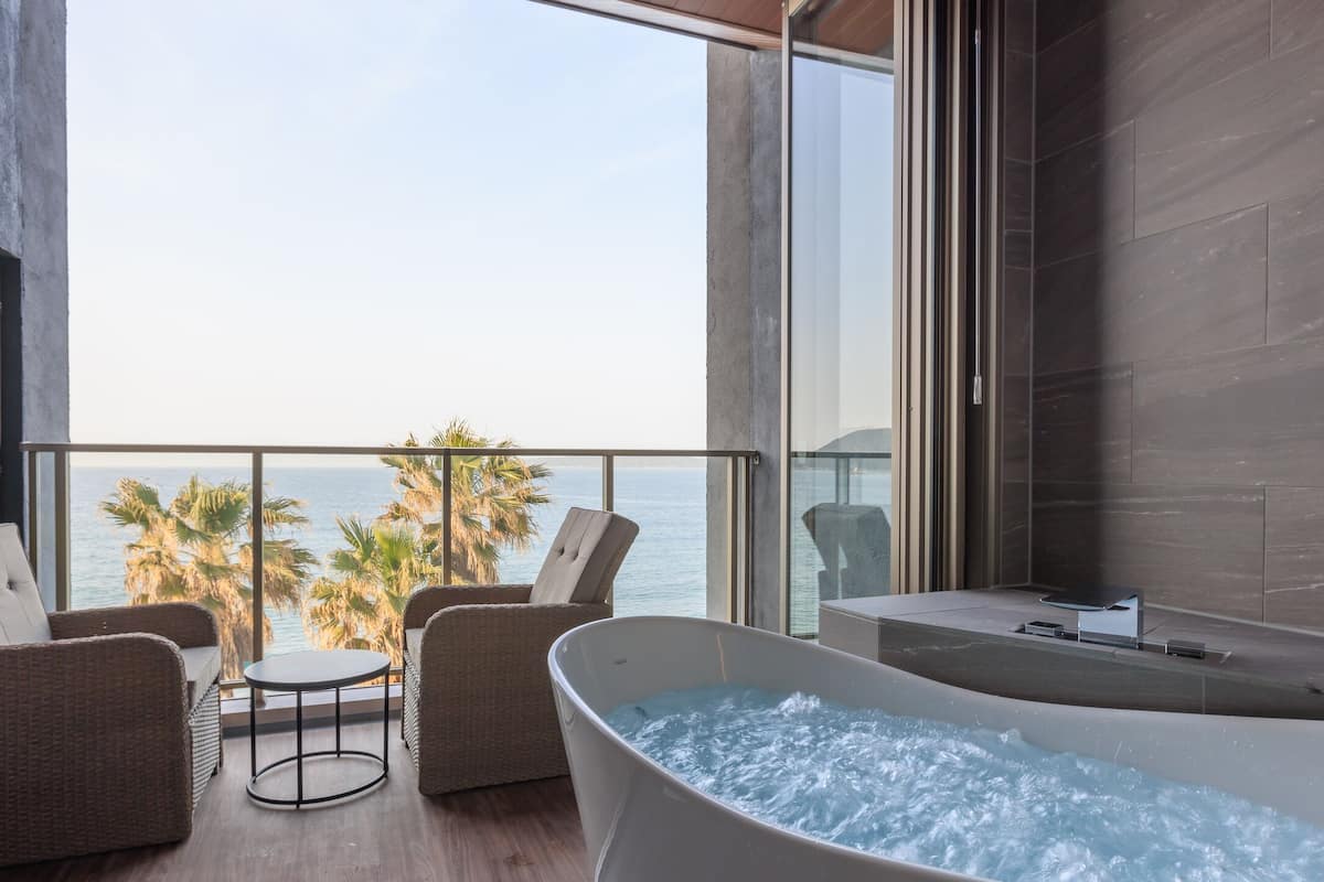 Luxury Twin Room | Bathroom | Jetted bath, rainfall showerhead, designer toiletries, hair dryer