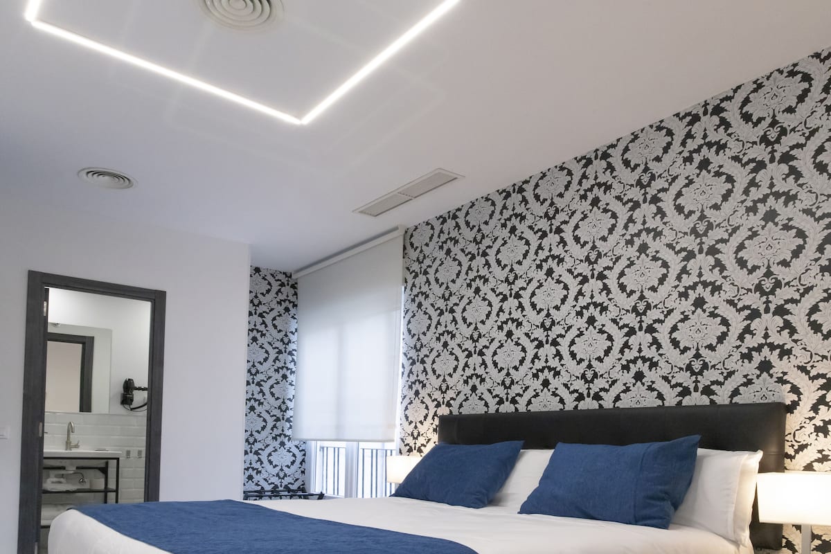 Premium bedding, memory-foam beds, blackout curtains, soundproofing