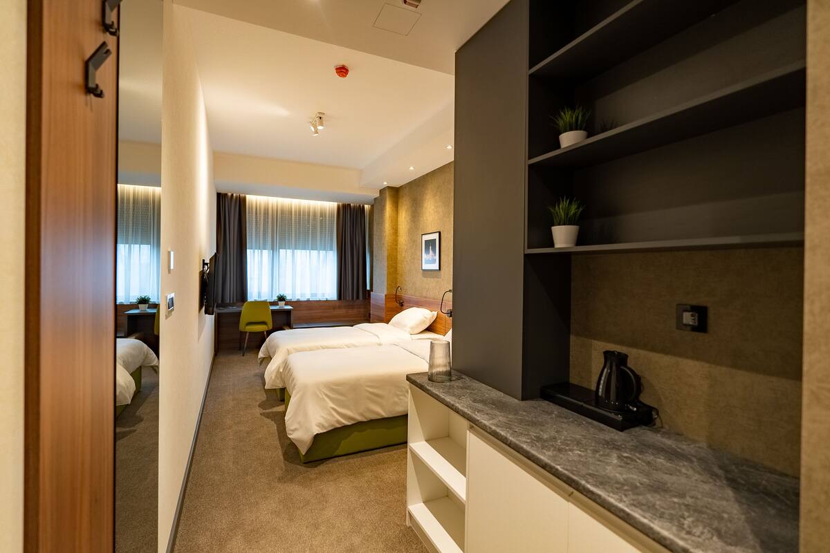 Ropa de cama de alta calidad y minibar