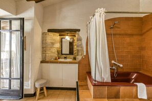 Bathtub, hair dryer, towels