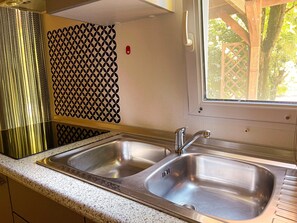 Fridge, microwave, stovetop, cookware/dishes/utensils