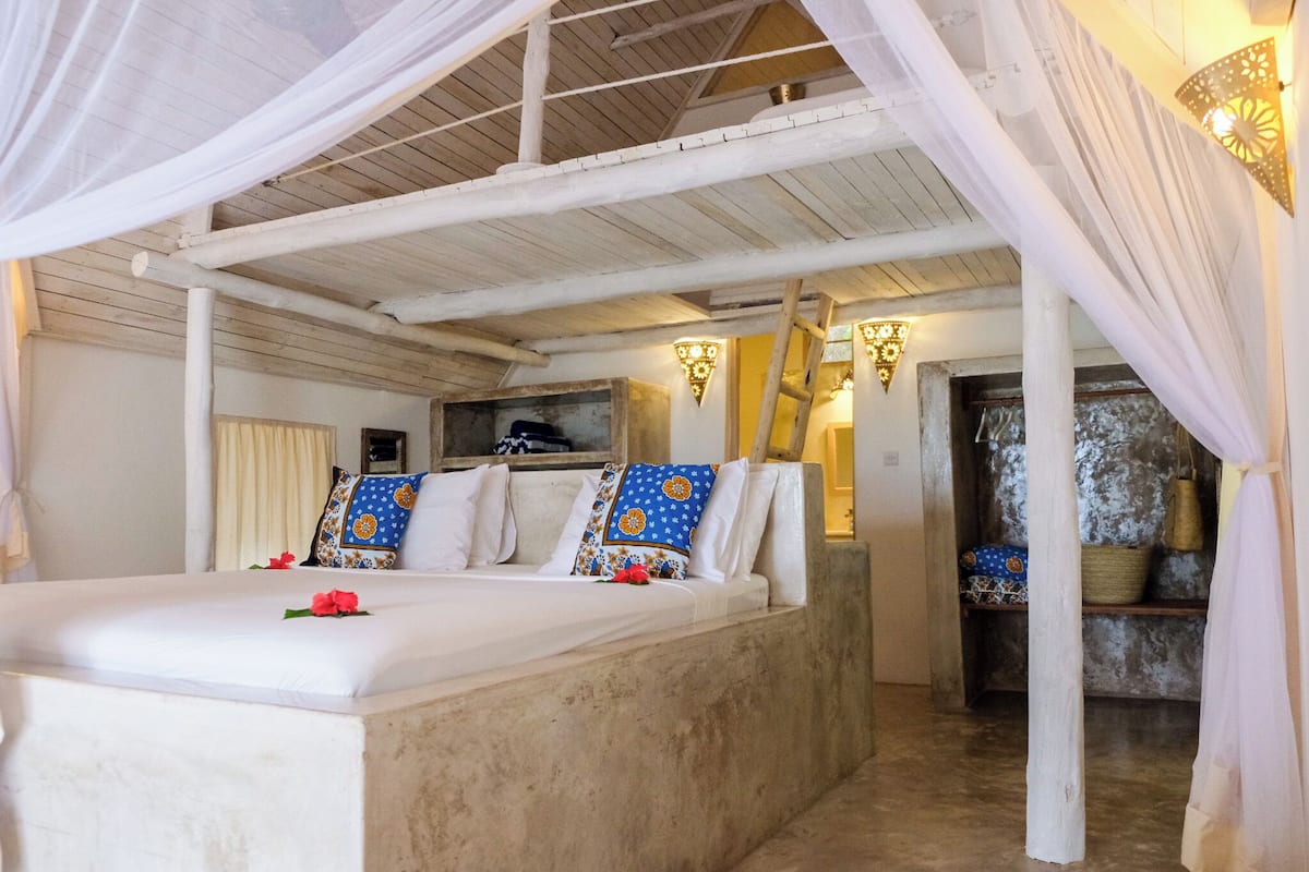 Chambre Quadruple Deluxe, vue plage, en front de plage