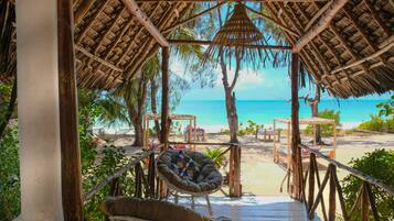 Deluxe Double Room, Beach View | Hypo-allergenic bedding, in-room safe, individually decorated