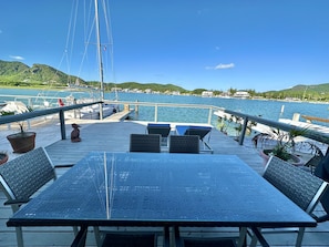 Outdoor dining - Modern Waterfront Villa (Jolly Harbour)