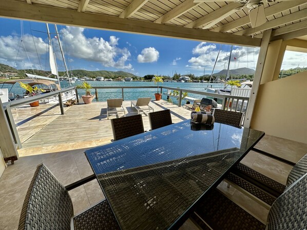 Outdoor dining - Modern Waterfront Villa (Jolly Harbour)