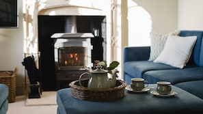 Woodburning Stove in Sitting Area, Rose Cottage Rodborough, Bolthole Retreats