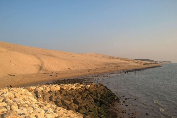 On the beach, sun-loungers