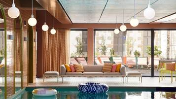 Indoor pool, open 7:00 AM to 10:00 PM, sun loungers