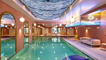 Indoor pool, open 7:00 AM to 10:00 PM, pool loungers