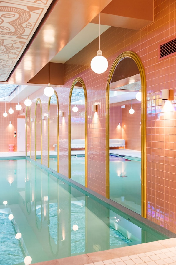 Indoor pool, open 7:00 AM to 10:00 PM, sun loungers