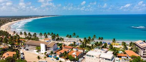 Perto da praia, areia branca 