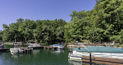 This wooded retreat has everything! Spring & Summer right around the corner!