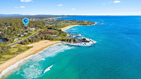 Experience the charm of a coastal town with a mix of residential areas and natural landscapes.